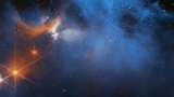 Il telescopio spaziale James Webb e la nube di ghiaccio nella costellazione del Camaleonte